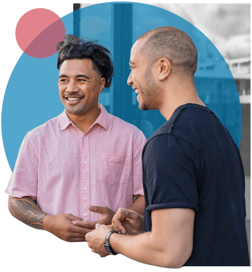 Two male Carers discussing with another their stories